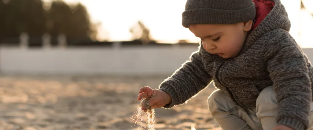 baby in sand